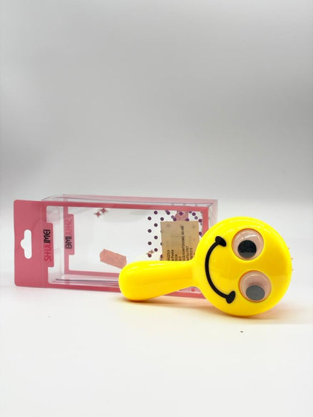 spazzola per capelli per bambini a forma di emoji sorridente, realizzata in plastica di colore giallo